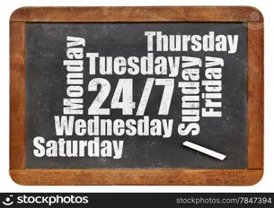 24/7 service word cloud on a vintage blackboard isolated on white