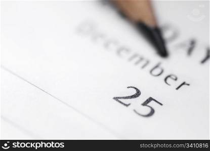 25th December in diary. Focus on 25th December in diary. Shallow DOF.