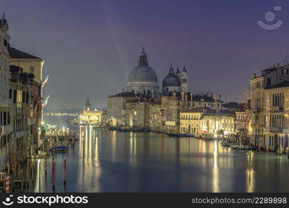 28 November 2015 Venice, italy, Canal grande with historical houses, gondole traditional boats and st may of health Basilica in background. venice the most beautiful city in the world