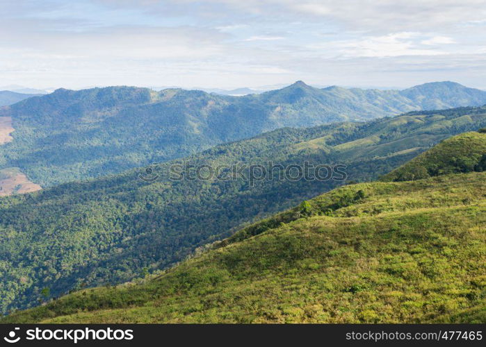3 Green Tree Mountain with Warm Sun Light and Blue Sky Cloud at Phu Langka National Park Zoom. Green Tree Mountain or Hill at Lan Hin Lan Pee Phu Langka National Park Northern Phayao Thailand Travel