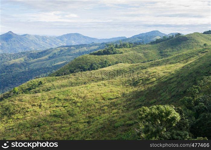 3 Green Tree Mountain with Warm Sun Light and Blue Sky Cloud at Phu Langka National Park Zoom. Green Tree Mountain or Hill at Lan Hin Lan Pee Phu Langka National Park Northern Phayao Thailand Travel