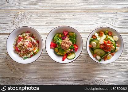 3 salad mix bowls healthy food on white wood table