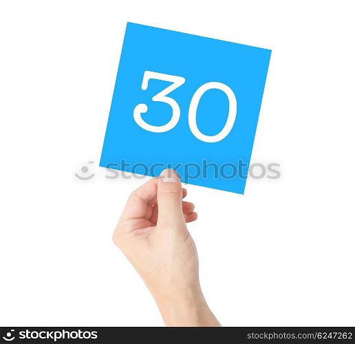 30 written on a card held by a hand