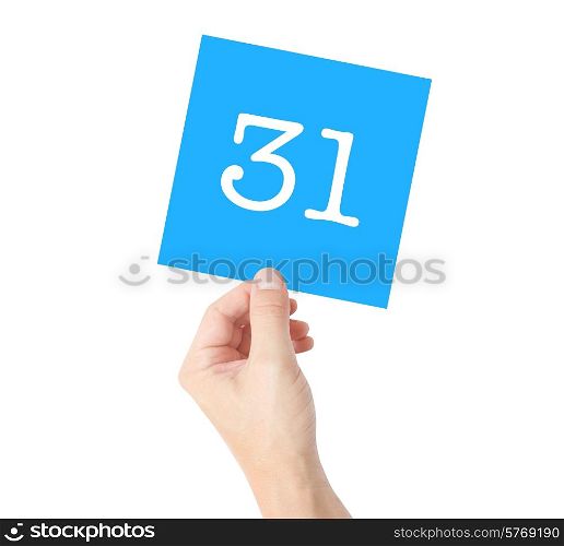 31 written on a card held by a hand