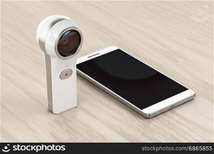 360 degree camera and smartphone on wood background
