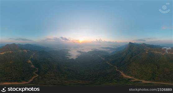 360 panorama by 180 degrees angle seamless panorama of aerial top view of forest trees and green mountain hills with fog, mist and clouds. Nature landscape background, Thailand.