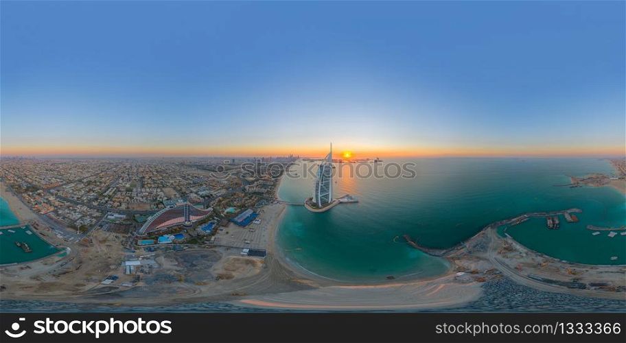 360 panorama by 180 degrees angle seamless panorama of aerial view of Burj Al Arab Jumeirah Island or boat building, Dubai Downtown skyline, UAE. Financial district in urban city. Skyscrapers.