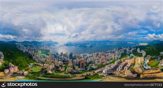 360 panorama by 180 degrees angle seamless panorama view of aerial view of Hong Kong Downtown. Financial district and business centers in technology smart city. skyscraper and buildings at noon.