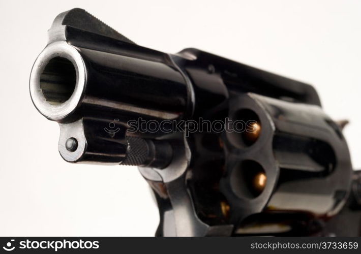 38 Caliber Revolver Pistol Loaded Cylinder Gun Barrel Close Up Pointed on White