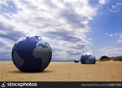 3d blue earth on the beach