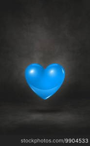 3D blue heart isolated on a black studio background. 3D illustration. 3D blue heart on a black studio background