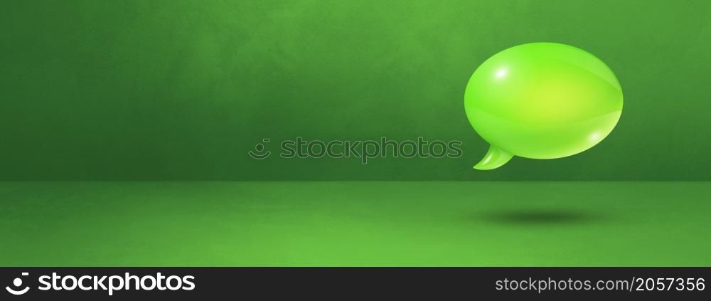 3D green speech bubble isolated on concrete wall banner background. Green speech bubble on concrete wall banner background