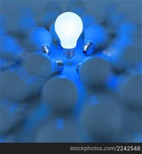 3d growing light bulb standing out from the unlit incandescent bulbs as leadership concept