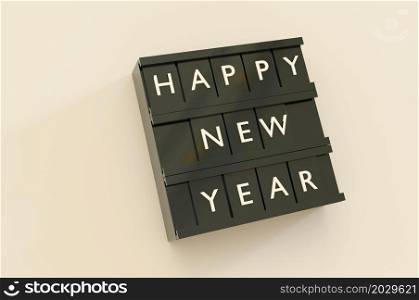 3d illustration. Happy New Year Text black Light Box on background . Copy Space For Message.