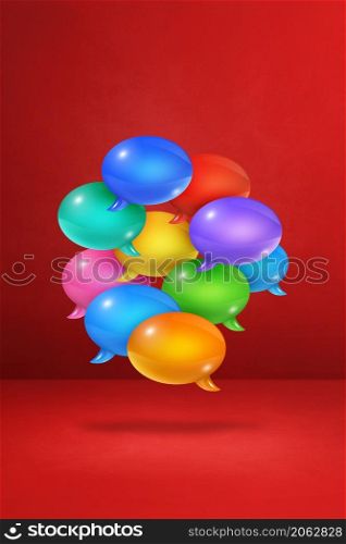 3D multicolor speech bubbles isolated on red vertical background. multicolor speech bubbles on red vertical background