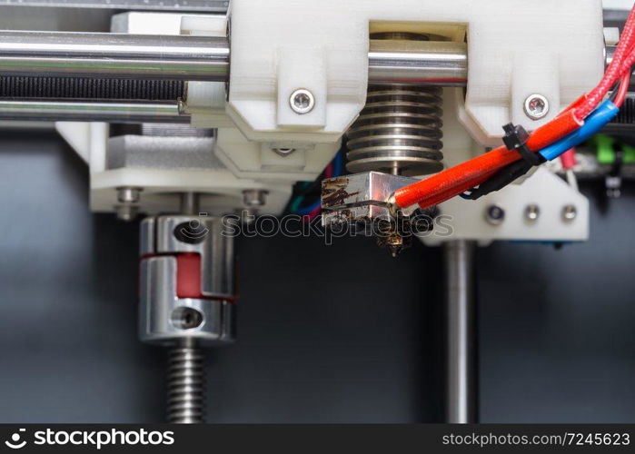 3d printer with bright green filament.. 3d printer with bright green filament