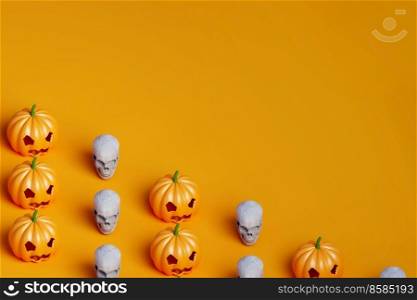 3d render of Halloween pumpkin and white skull covering half of the orange background