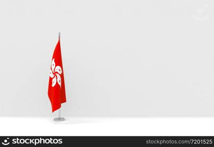 3d rendering. folding Hong Kong National flag pole podium on empty gray cement wall stage background.