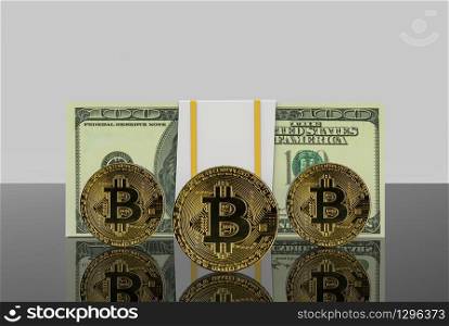 3d rendering. gold cryptocurrency and US daollar banknote on gray copy space background.