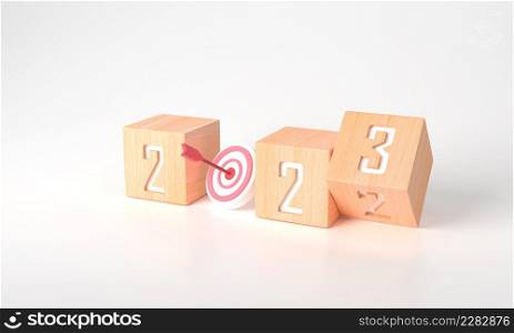 "3d rendering of Business plan or Happy new year in target 2023 concept for business strategy and development. Minimal wooden cubes "2022" to "2023" text on white background and copy space.Banner plan."