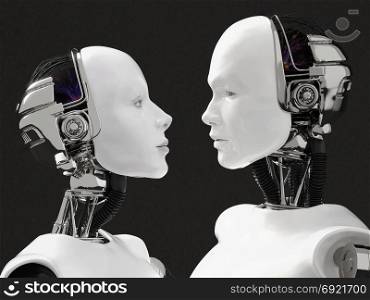 3D rendering of the heads of a female and male robot. They are looking at each other. Black background.