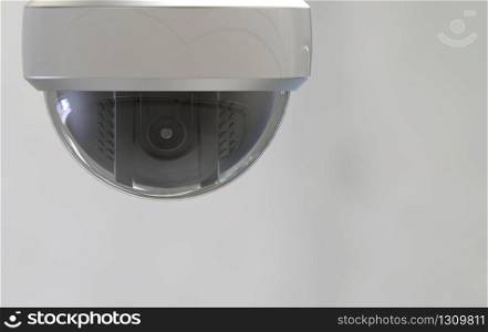 3d rendering. Security sphere dome camera with clipping path isolated on gray background.