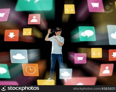 3d technology, augmented reality, gaming, cyberspace and people concept - happy young man in virtual reality headset or 3d glasses with menu icons over black background