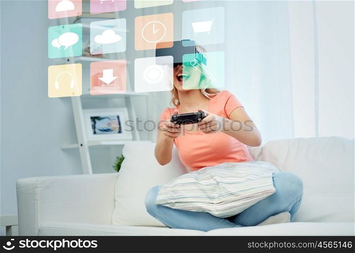 3d technology, augmented reality, gaming, multimedia and people concept - happy young woman with virtual headset or 3d glasses playing video game with controller gamepad at home and menu icons