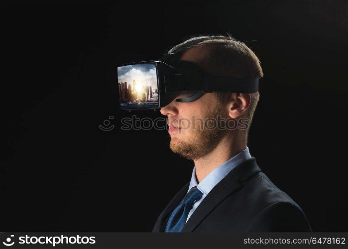 3d technology, virtual reality, cyberspace and augmented reality concept - young businessman with singapore city on virtual headset or 3d glasses screen over black background. businessman in virtual reality glasses or headset. businessman in virtual reality glasses or headset