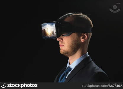 3d technology, virtual reality, cyberspace and augmented reality concept - young businessman with singapore city on virtual headset or 3d glasses screen over black background. businessman in virtual reality glasses or headset. businessman in virtual reality glasses or headset