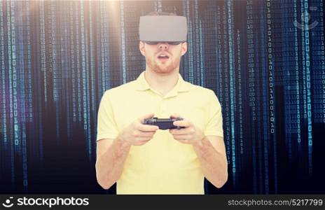3d technology, virtual reality, entertainment and people concept - happy young man with virtual reality headset or 3d glasses playing with game controller gamepad over binary code background. man in virtual reality headset or 3d glasses