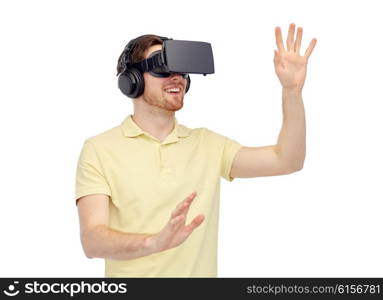 3d technology, virtual reality, entertainment and people concept - happy young man with virtual reality headset or 3d glasses playing game