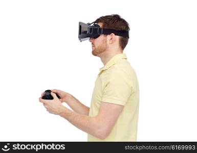 3d technology, virtual reality, entertainment and people concept - happy young man with virtual reality headset or 3d glasses playing with game controller gamepad