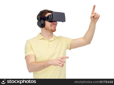 3d technology, virtual reality, entertainment and people concept - happy young man with virtual reality headset or 3d glasses playing game