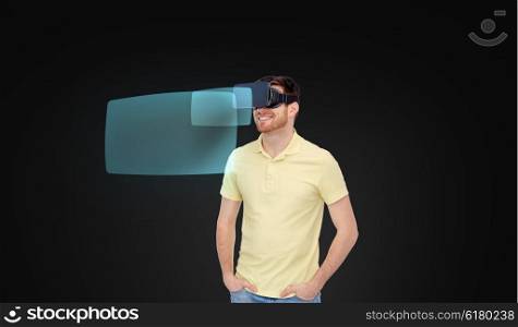 3d technology, virtual reality, entertainment and people concept - happy young man in virtual reality headset or 3d glasses with screen projections sover black background