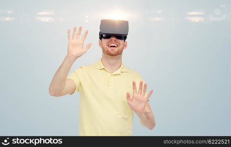 3d technology, virtual reality, entertainment and people concept - happy young man with virtual reality headset or 3d glasses playing game over gray background