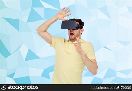 3d technology, virtual reality, entertainment and people concept - scared young man with virtual reality headset or 3d glasses playing game over low poly background