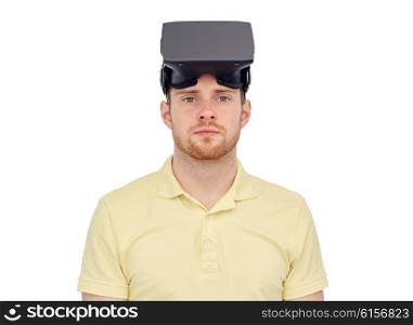 3d technology, virtual reality, entertainment and people concept - young man with virtual reality headset or 3d glasses