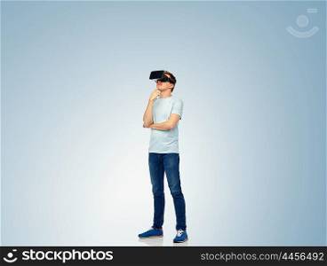 3d technology, virtual reality, entertainment, cyberspace and people concept - happy young man with virtual reality headset or 3d glasses thinking and looking at something