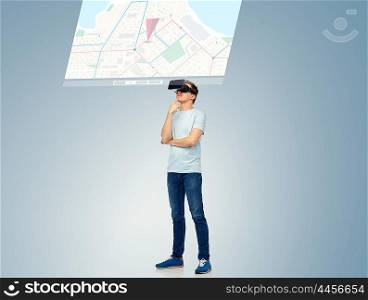 3d technology, virtual reality, entertainment, cyberspace and people concept - happy young man with virtual reality headset or 3d glasses thinking and looking at screen with gps navigator map