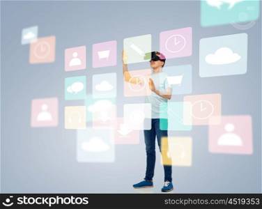 3d technology, virtual reality, entertainment, cyberspace and people concept - happy young man with virtual reality headset or 3d glasses playing game and touching screen with menu icons