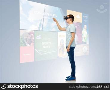 3d technology, virtual reality, entertainment, cyberspace and people concept - happy young man with virtual reality headset or 3d glasses playing game and touching screen with internet news