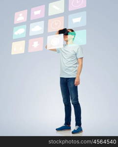 3d technology, virtual reality, entertainment, cyberspace and people concept - happy young man with virtual reality headset or 3d glasses looking at screen with menu icons