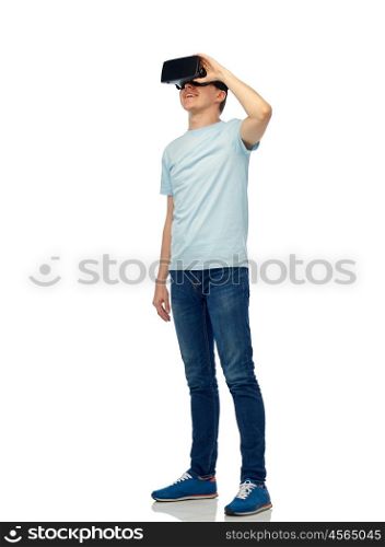 3d technology, virtual reality, entertainment, cyberspace and people concept - happy young man with virtual reality headset or 3d glasses