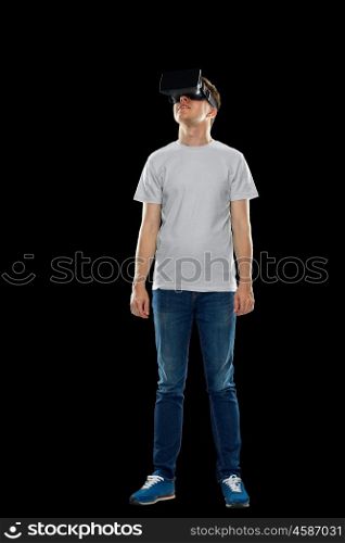 3d technology, virtual reality, entertainment, cyberspace and people concept - happy young man with virtual reality headset or 3d glasses looking up