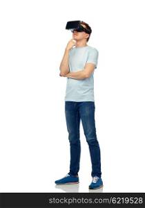 3d technology, virtual reality, entertainment, cyberspace and people concept - happy young man with virtual reality headset or 3d glasses thinking