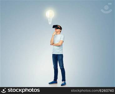 3d technology, virtual reality, entertainment, cyberspace and people concept - happy young man with virtual reality headset or 3d glasses thinking and looking at light bulb projection