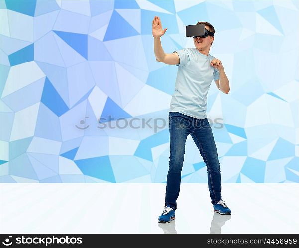 3d technology, virtual reality, entertainment, cyberspace and people concept - young man with virtual reality headset or 3d glasses playing game and fighting over low poly background