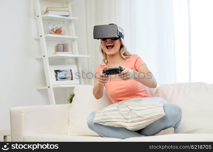 3d technology, virtual reality, gaming, entertainment and people concept - happy young woman with virtual reality headset or 3d glasses playing video game with controller gamepad at home