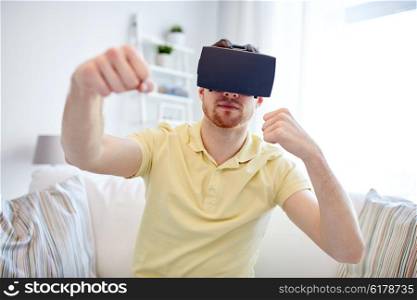 3d technology, virtual reality, gaming, entertainment and people concept - young man with virtual reality headset or 3d glasses playing combat game and fighting